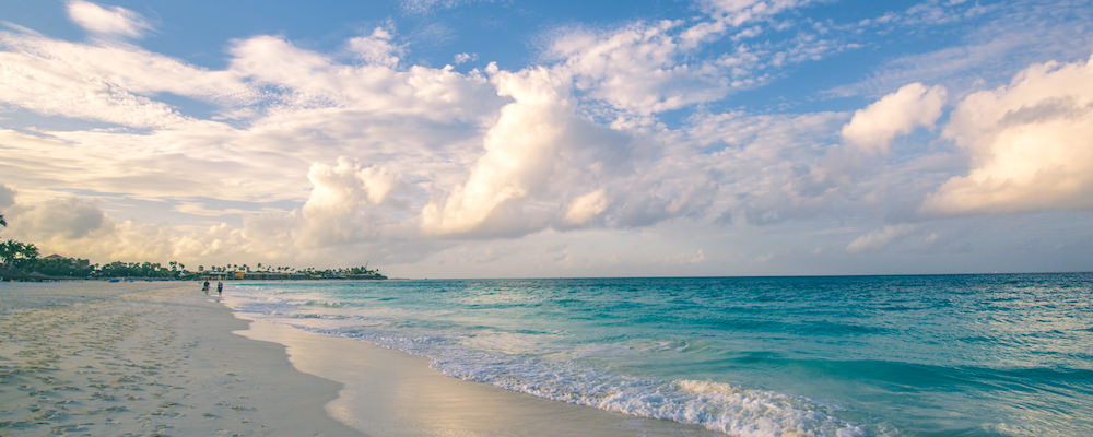 a picture of clouds over the best luxury hotels in  aruba