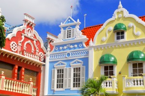 As the sun in Oranjestad casts its warm glow upon the colorful facades, the city comes alive with vibrant energy. The vivid houses create a picturesque backdrop against the clear blue skies, creating a feast for the eyes and a perfect setting for capturing memorable photographs.