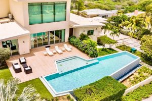 the garden and outpoor pool at lg smith boulevard near arashi beach in aruba