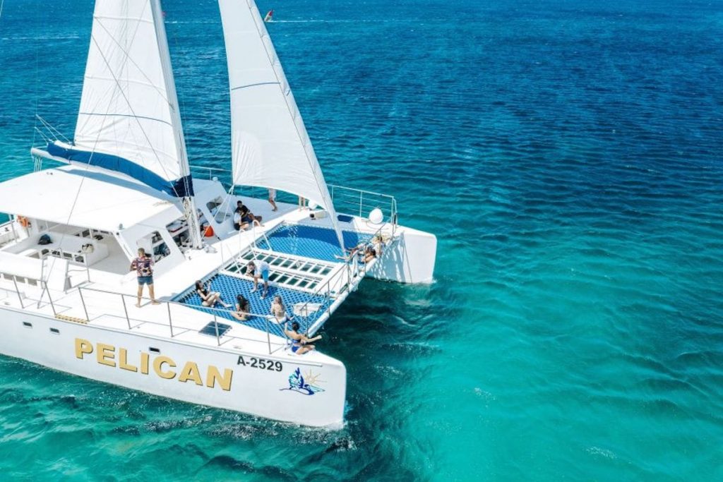 Snorkelling from a catamaran in the warm waters of Aruba.