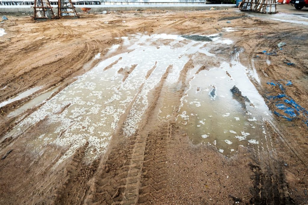 A puddle of water at a construction site. This is where Mosquitos tend to lay their eggs.