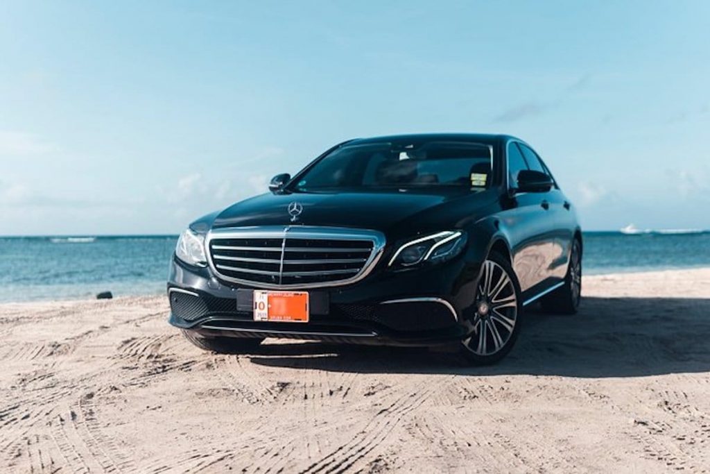 Getting picked up from the Aruba airport in a luxury sedan.