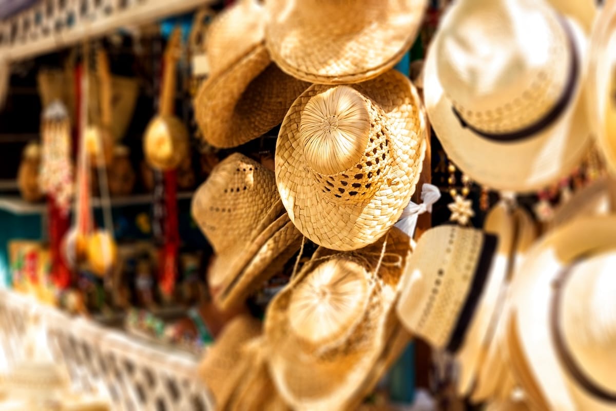 A selection of summer hats at a Caribbean flea market, made my local craftsmen.